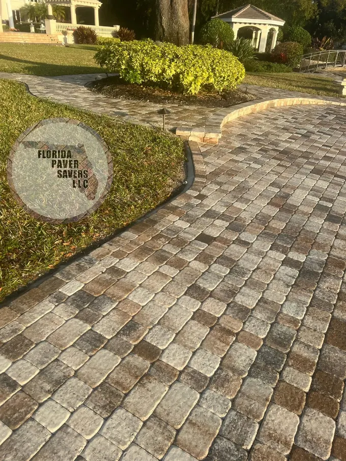 Paver patio with curved steps and adjoining walkways
