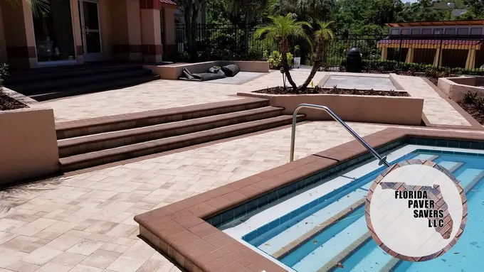 Commercial paver pool terrace with broad steps and matching pool coping
